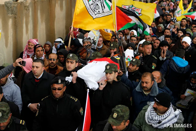 Palestinians carry the body of Ruqya Abu Eid, 13, during her funeral, who Israeli military said was shot dead by Israeli soldiers after he tried to stab a soldier, in the West Bank city of Hebron, on January, 24, 2016. P...