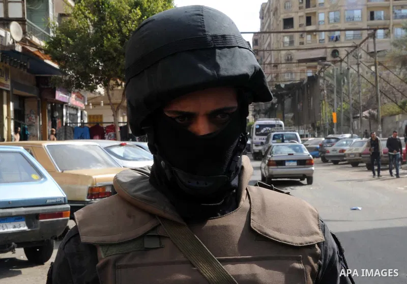 A member of the Egyptian police special forces stands guard on Cairo's landmark Tahrir Square on January 25, 2016, as the country marks the fifth anniversary of the 2011 uprising. Egyptians marked the fifth anniversary o...