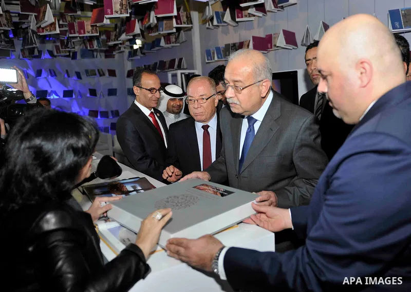 Egyptian Prime Minister Sherif Ismail opens the Cairo International Book Fair, in Cairo, Egypt, on Jan. 27, 2016. Photo by Stranger