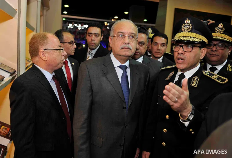 Egyptian Prime Minister Sherif Ismail opens the Cairo International Book Fair, in Cairo, Egypt, on Jan. 27, 2016. Photo by Stranger