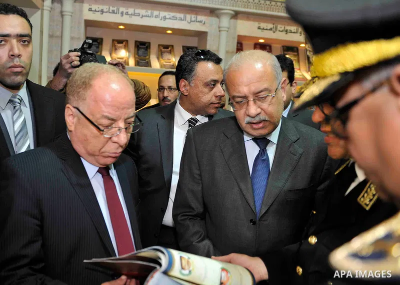Egyptian Prime Minister Sherif Ismail opens the Cairo International Book Fair, in Cairo, Egypt, on Jan. 27, 2016. Photo by Stranger