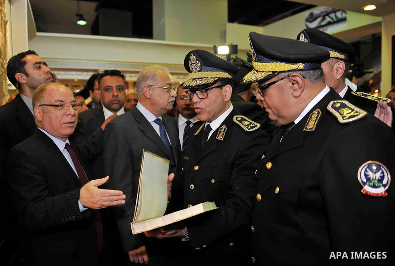 Egyptian Prime Minister Sherif Ismail opens the Cairo International Book Fair, in Cairo, Egypt, on Jan. 27, 2016. Photo by Stranger