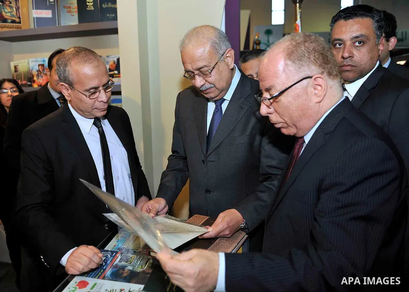 Egyptian Prime Minister Sherif Ismail opens the Cairo International Book Fair, in Cairo, Egypt, on Jan. 27, 2016. Photo by Stranger