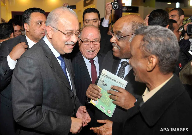 Egyptian Prime Minister Sherif Ismail opens the Cairo International Book Fair, in Cairo, Egypt, on Jan. 27, 2016. Photo by Stranger