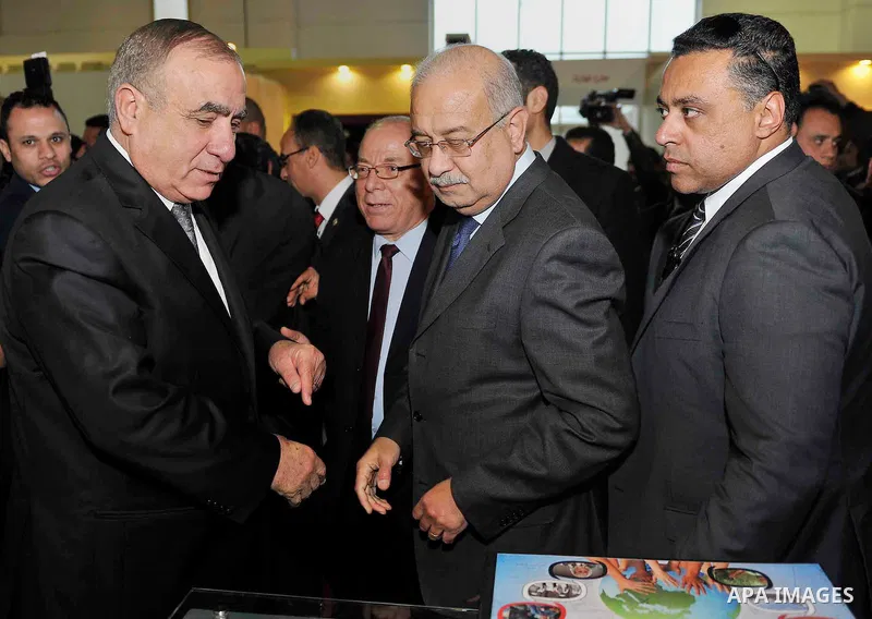 Egyptian Prime Minister Sherif Ismail opens the Cairo International Book Fair, in Cairo, Egypt, on Jan. 27, 2016. Photo by Stranger