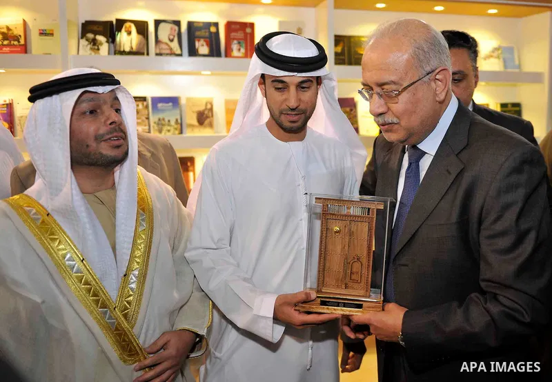 Egyptian Prime Minister Sherif Ismail opens the Cairo International Book Fair, in Cairo, Egypt, on Jan. 27, 2016. Photo by Stranger