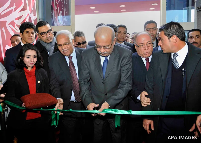Egyptian Prime Minister Sherif Ismail opens the Cairo International Book Fair, in Cairo, Egypt, on Jan. 27, 2016. Photo by Stranger