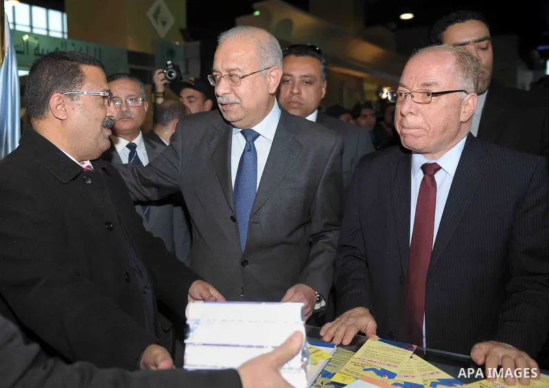 Egyptian Prime Minister Sherif Ismail opens the Cairo International Book Fair, in Cairo, Egypt, on Jan. 27, 2016. Photo by Stranger