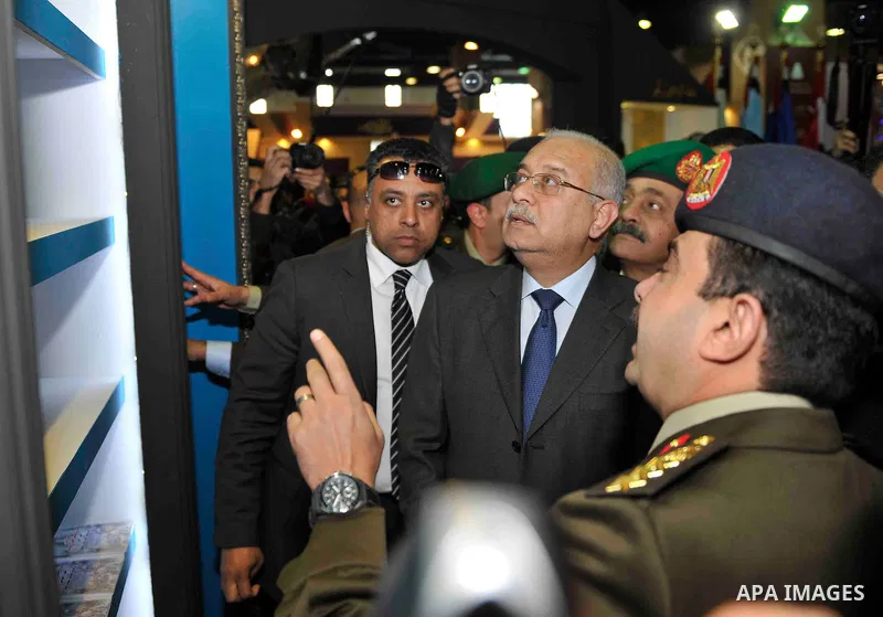 Egyptian Prime Minister Sherif Ismail opens the Cairo International Book Fair, in Cairo, Egypt, on Jan. 27, 2016. Photo by Stranger