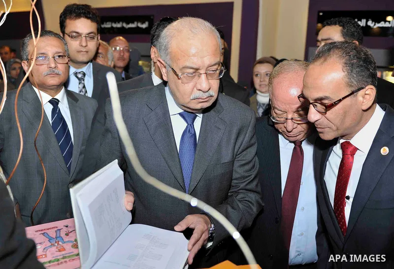 Egyptian Prime Minister Sherif Ismail opens the Cairo International Book Fair, in Cairo, Egypt, on Jan. 27, 2016. Photo by Stranger