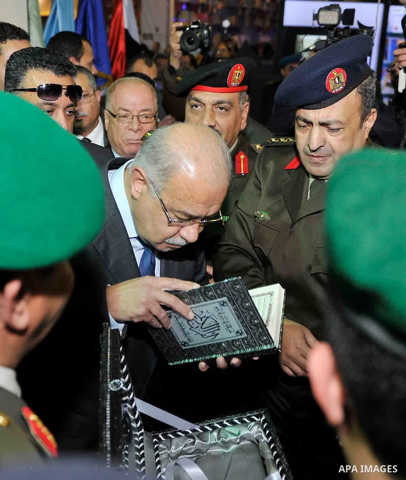 Egyptian Prime Minister Sherif Ismail opens the Cairo International Book Fair, in Cairo, Egypt, on Jan. 27, 2016. Photo by Stranger