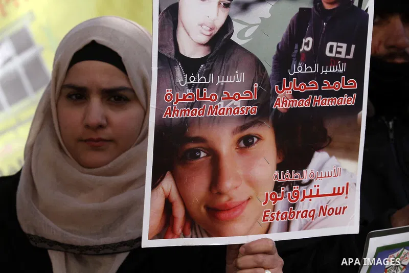 Palestinians take part in a protest demanding release the prisoners in Israeli jails, in the West bank city of Nablus, on January 28, 2016. Photo by Nedal Eshtayah