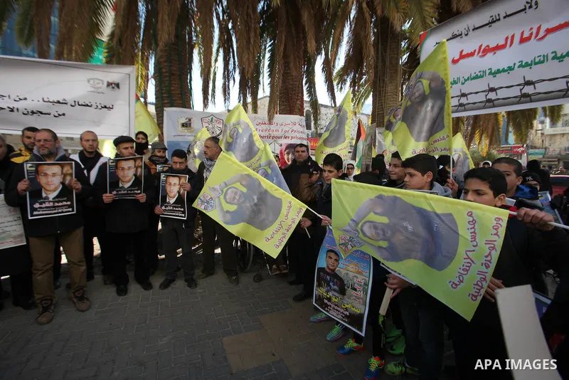 Palestinians take part in a protest demanding release the prisoners in Israeli jails, in the West bank city of Nablus, on January 28, 2016. Photo by Nedal Eshtayah