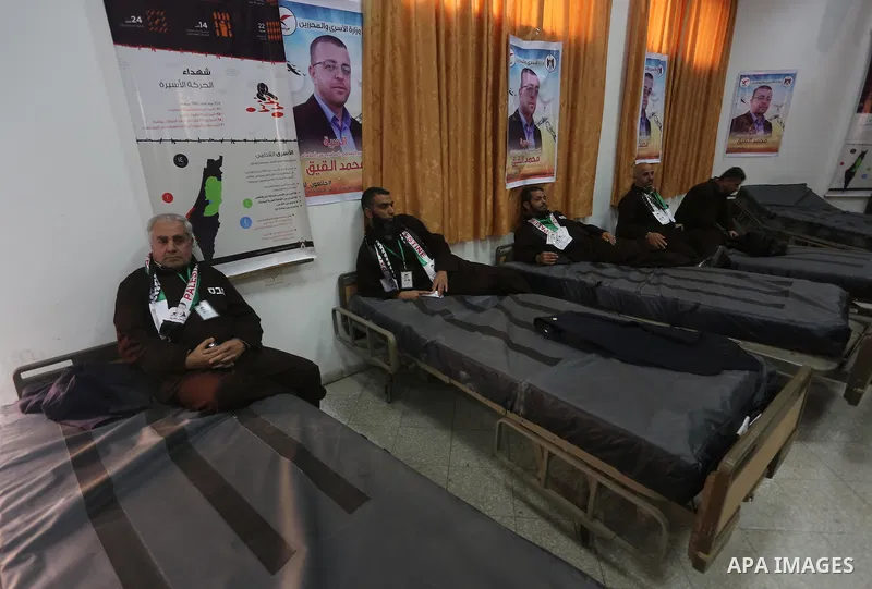 Palestinians on a hunger strike in solidarity with journalist Mohammed al-Qiq who is imprisoned in an Israeli jail at the Ministry of Prisoners, in Gaza City, on January 30, 2016. Qiq is being held under Israel's controv...