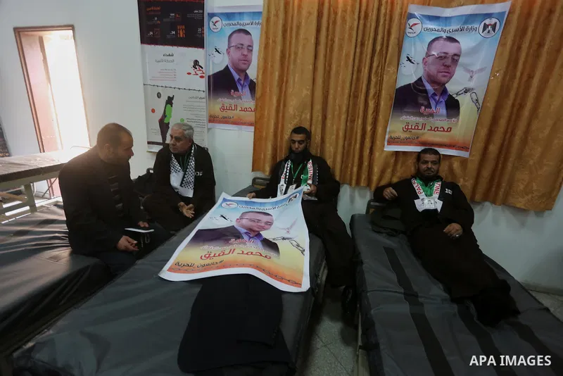 Palestinians on a hunger strike in solidarity with journalist Mohammed al-Qiq who is imprisoned in an Israeli jail at the Ministry of Prisoners, in Gaza City, on January 30, 2016. Qiq is being held under Israel's controv...