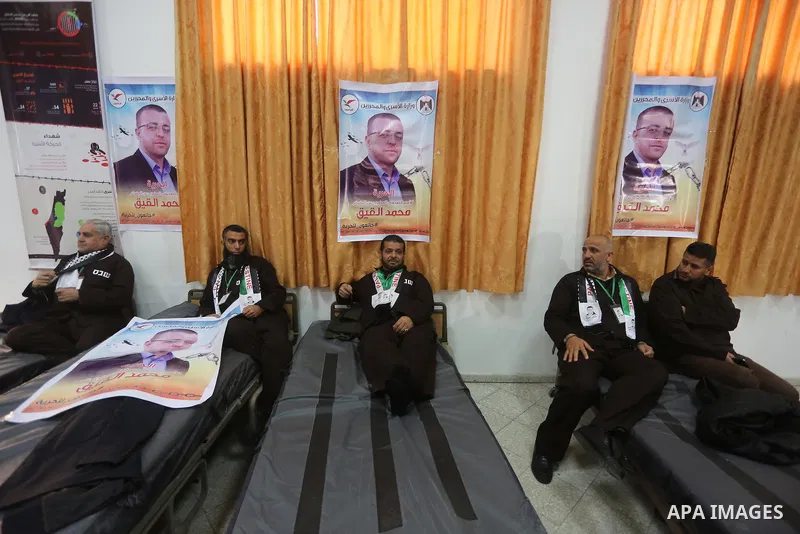 Palestinians on a hunger strike in solidarity with journalist Mohammed al-Qiq who is imprisoned in an Israeli jail at the Ministry of Prisoners, in Gaza City, on January 30, 2016. Qiq is being held under Israel's controv...