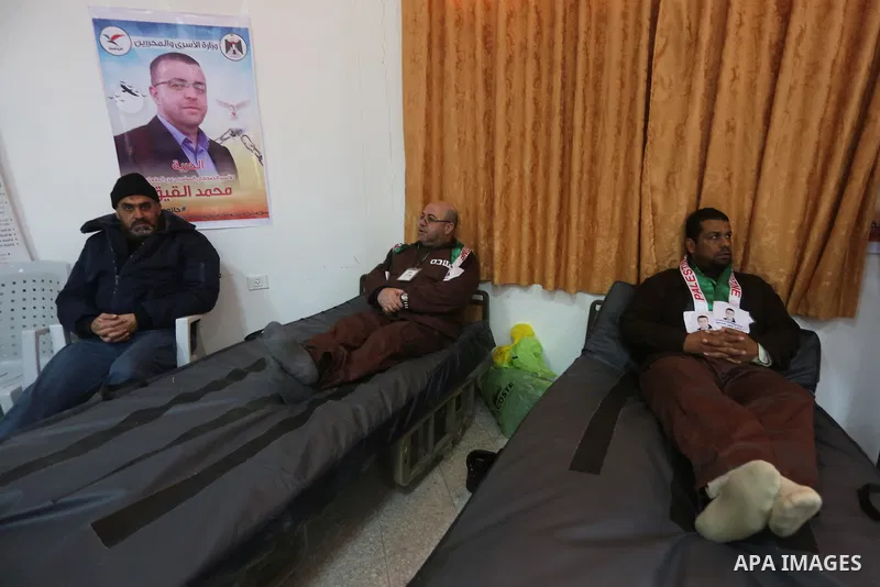 Palestinians on a hunger strike in solidarity with journalist Mohammed al-Qiq who is imprisoned in an Israeli jail at the Ministry of Prisoners, in Gaza City, on January 30, 2016. Qiq is being held under Israel's controv...