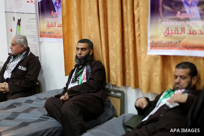 Palestinians on a hunger strike in solidarity with journalist Mohammed al-Qiq who is imprisoned in an Israeli jail at the Ministry of Prisoners, in Gaza City, on January 30, 2016. Qiq is being held under Israel's controv...