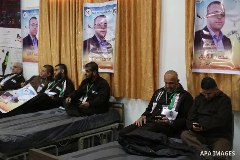 Palestinians on a hunger strike in solidarity with journalist Mohammed al-Qiq who is imprisoned in an Israeli jail at the Ministry of Prisoners, in Gaza City, on January 30, 2016. Qiq is being held under Israel's controv...