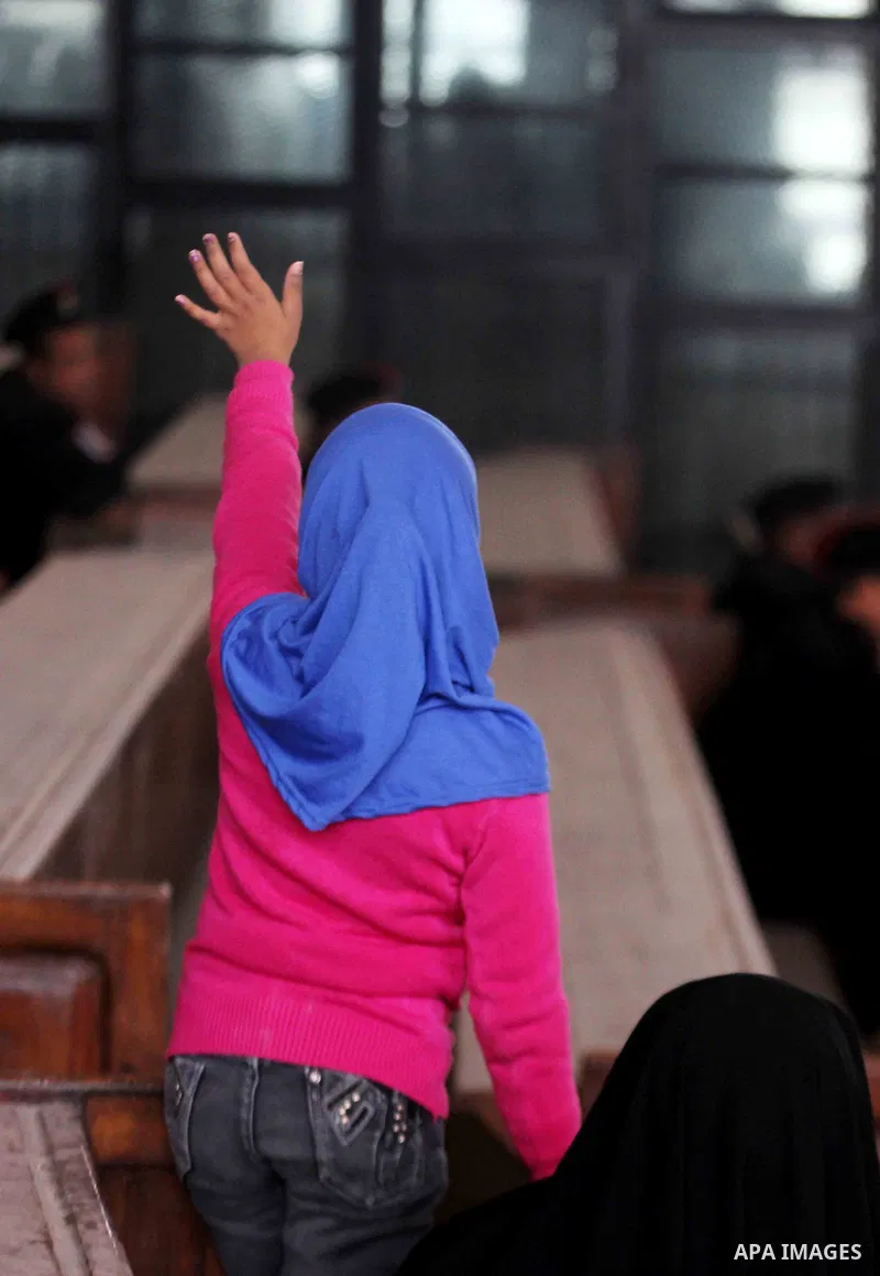 Relatives of Ansar Bait Al-Maqdis group attend their trial in Cairo on January 30, 2016, on charges of assassination of police officers, attempted assassination of interior minister Mohamed Ibrahim and explosions near se...