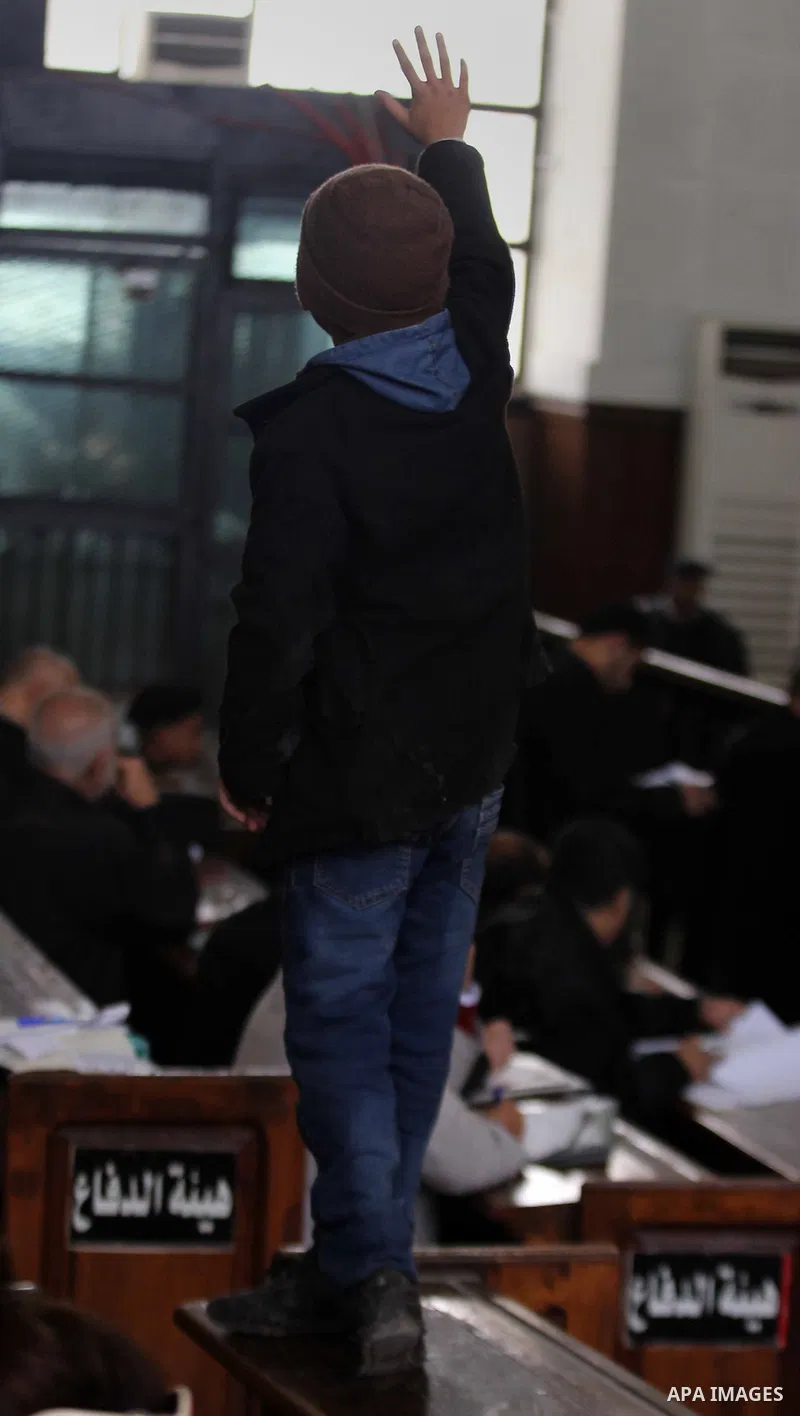 Relatives of Ansar Bait Al-Maqdis group attend their trial in Cairo on January 30, 2016, on charges of assassination of police officers, attempted assassination of interior minister Mohamed Ibrahim and explosions near se...