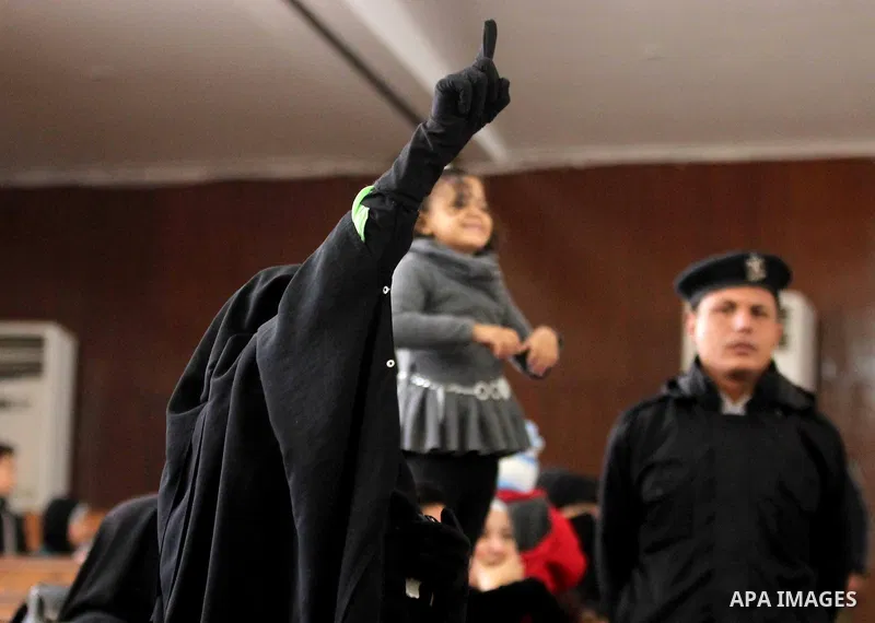 Relatives of Ansar Bait Al-Maqdis group attend their trial in Cairo on January 30, 2016, on charges of assassination of police officers, attempted assassination of interior minister Mohamed Ibrahim and explosions near se...