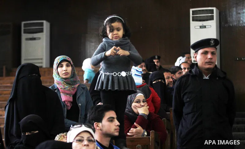Relatives of Ansar Bait Al-Maqdis group attend their trial in Cairo on January 30, 2016, on charges of assassination of police officers, attempted assassination of interior minister Mohamed Ibrahim and explosions near se...