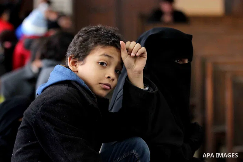 Relatives of Ansar Bait Al-Maqdis group attend their trial in Cairo on January 30, 2016, on charges of assassination of police officers, attempted assassination of interior minister Mohamed Ibrahim and explosions near se...