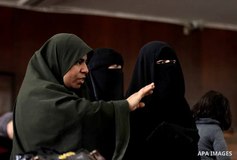 Relatives of Ansar Bait Al-Maqdis group attend their trial in Cairo on January 30, 2016, on charges of assassination of police officers, attempted assassination of interior minister Mohamed Ibrahim and explosions near se...