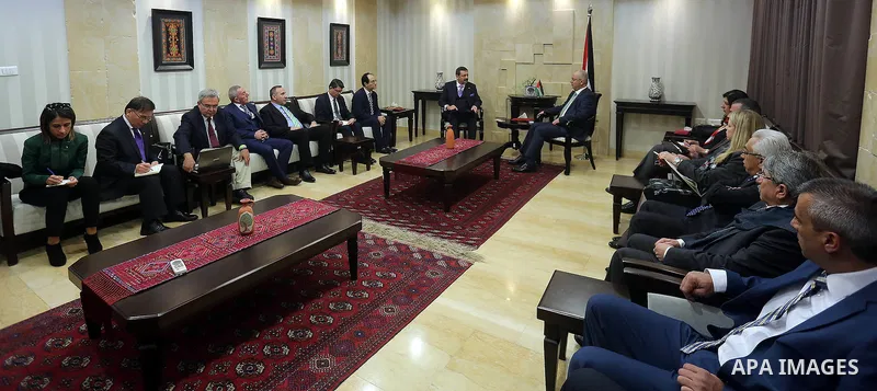 Palestinian Prime Minister Rami Hamdallah meets with President of the Union of Turkish Chambers of Commerce Refaat Oglo, in the West Bank city of Ramallah on Jan. 31, 2016. Photo by Prime Minister Office