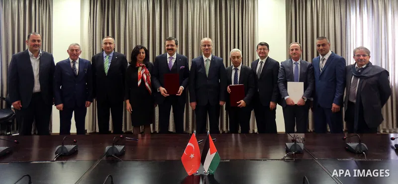 Palestinian Prime Minister Rami Hamdallah meets with President of the Union of Turkish Chambers of Commerce Refaat Oglo, in the West Bank city of Ramallah on Jan. 31, 2016. Photo by Prime Minister Office