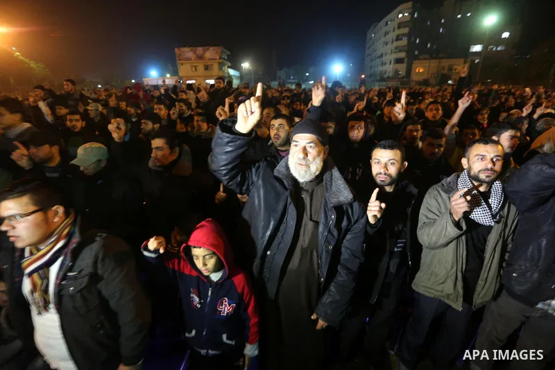 Palestinians supporting Hamas movement take part during a gathering to pay tribute to the brigade's militants who died after a tunnel collapsed in the Gaza Strip on January 31, 2016 in Gaza city. Seven Hamas militants we...