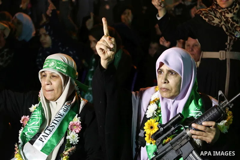 Palestinians supporting Hamas movement take part during a gathering to pay tribute to the brigade's militants who died after a tunnel collapsed in the Gaza Strip on January 31, 2016 in Gaza city. Seven Hamas militants we...
