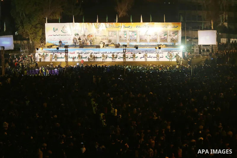 Palestinians supporting Hamas movement take part during a gathering to pay tribute to the brigade's militants who died after a tunnel collapsed in the Gaza Strip on January 31, 2016 in Gaza city. Seven Hamas militants we...