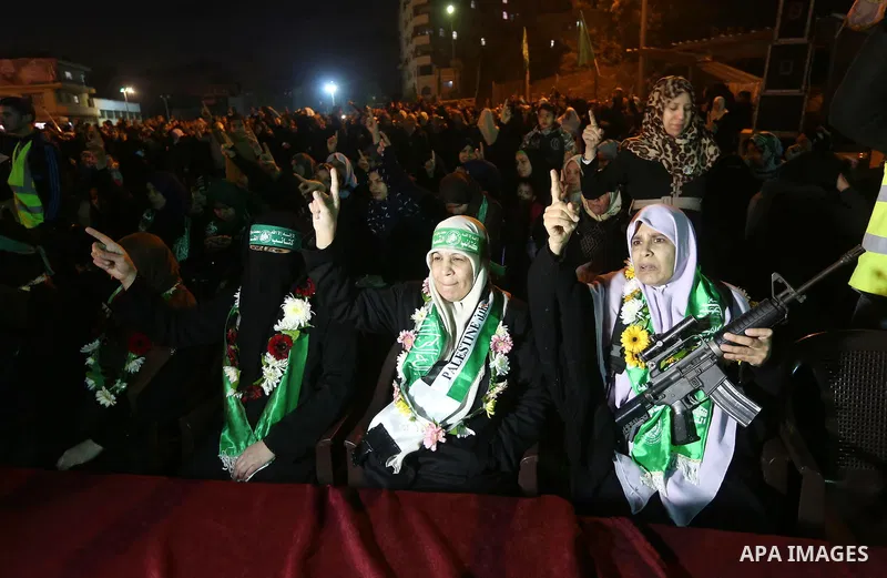 Palestinians supporting Hamas movement take part during a gathering to pay tribute to the brigade's militants who died after a tunnel collapsed in the Gaza Strip on January 31, 2016 in Gaza city. Seven Hamas militants we...