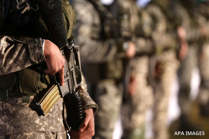 Palestinian members of the Ezzedine al-Qassam Brigades, the armed wing of the Hamas movement, take part in a gathering on January 31, 2016 in Gaza city to pay tribute to their fellow militants who died after a tunnel col...