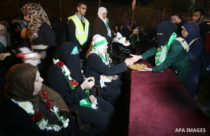 Palestinians supporting Hamas movement take part during a gathering to pay tribute to the brigade's militants who died after a tunnel collapsed in the Gaza Strip on January 31, 2016 in Gaza city. Seven Hamas militants we...