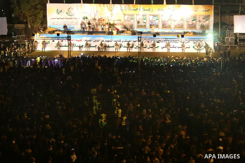 Palestinians supporting Hamas movement take part during a gathering to pay tribute to the brigade's militants who died after a tunnel collapsed in the Gaza Strip on January 31, 2016 in Gaza city. Seven Hamas militants we...