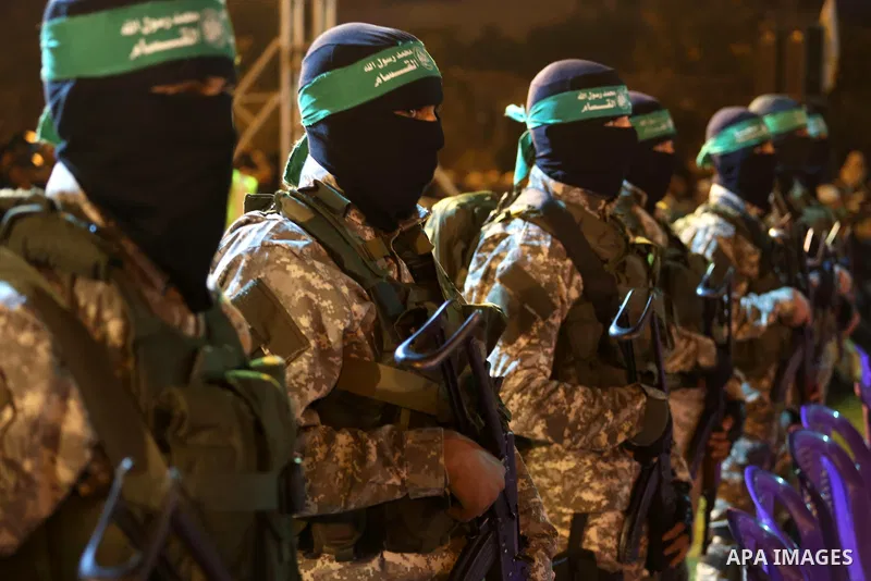 Palestinian members of the Ezzedine al-Qassam Brigades, the armed wing of the Hamas movement, take part in a gathering on January 31, 2016 in Gaza city to pay tribute to their fellow militants who died after a tunnel col...