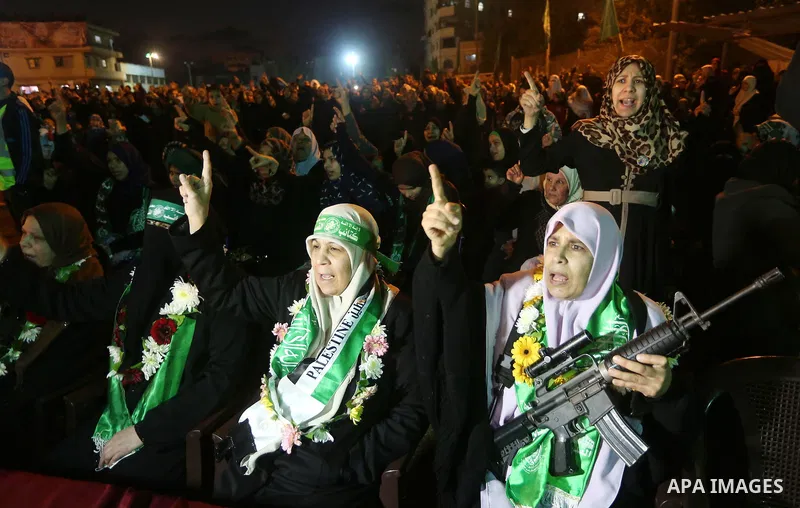 Palestinians supporting Hamas movement take part during a gathering to pay tribute to the brigade's militants who died after a tunnel collapsed in the Gaza Strip on January 31, 2016 in Gaza city. Seven Hamas militants we...