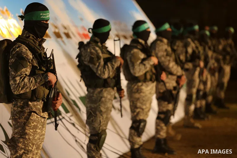 Palestinian members of the Ezzedine al-Qassam Brigades, the armed wing of the Hamas movement, take part in a gathering on January 31, 2016 in Gaza city to pay tribute to their fellow militants who died after a tunnel col...