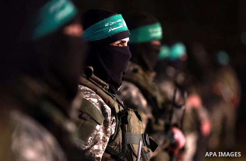 Palestinian members of the Ezzedine al-Qassam Brigades, the armed wing of the Hamas movement, take part in a gathering on January 31, 2016 in Gaza city to pay tribute to their fellow militants who died after a tunnel col...
