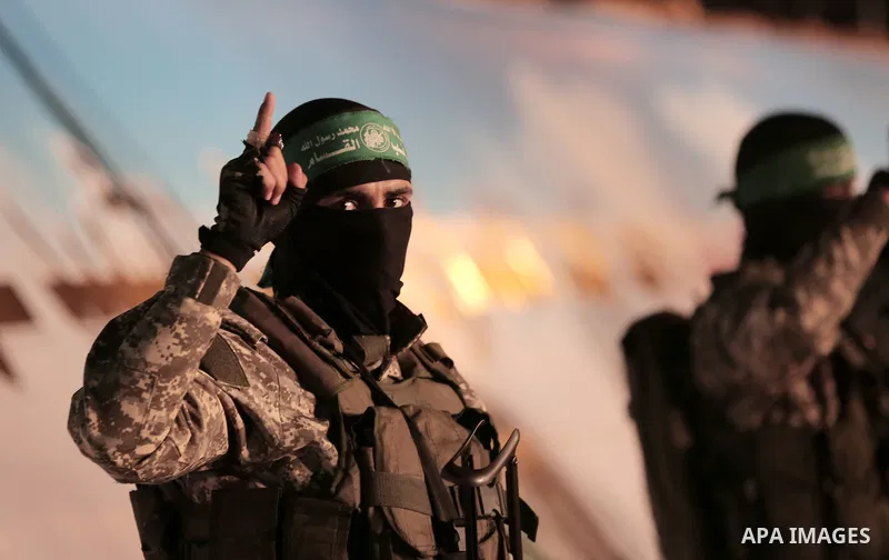 Palestinian members of the Ezzedine al-Qassam Brigades, the armed wing of the Hamas movement, take part in a gathering on January 31, 2016 in Gaza city to pay tribute to their fellow militants who died after a tunnel col...