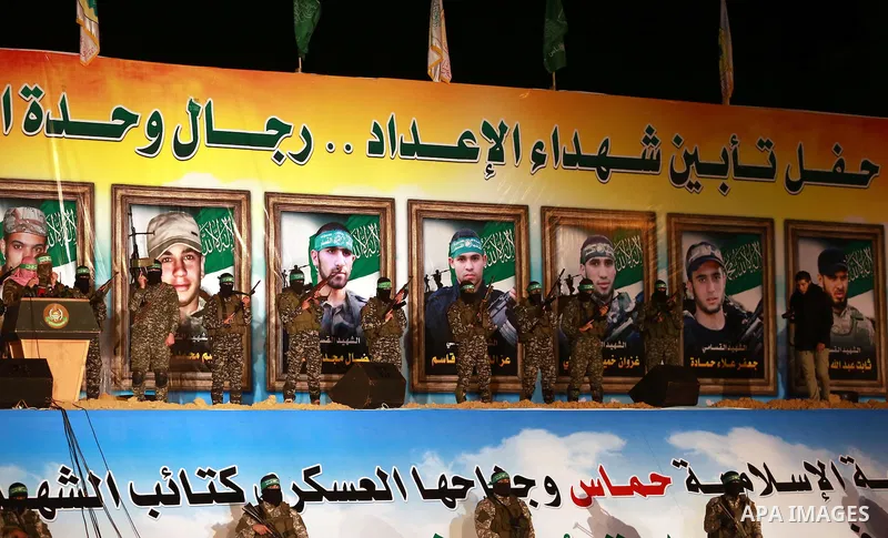 Spokesman of al-Qassam Brigades, the military wing of Hamas movement, Abu Obeida speaks during a gathering to pay tribute to the brigade's militants who died after a tunnel collapsed in the Gaza Strip on January 31, 2016...