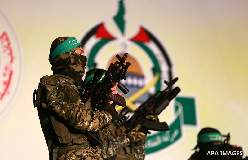 Palestinian members of the Ezzedine al-Qassam Brigades, the armed wing of the Hamas movement, take part in a gathering on January 31, 2016 in Gaza city to pay tribute to their fellow militants who died after a tunnel col...