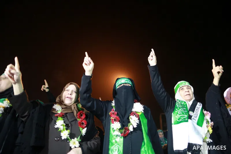 Palestinians supporting Hamas movement take part during a gathering to pay tribute to the brigade's militants who died after a tunnel collapsed in the Gaza Strip on January 31, 2016 in Gaza city. Seven Hamas militants we...