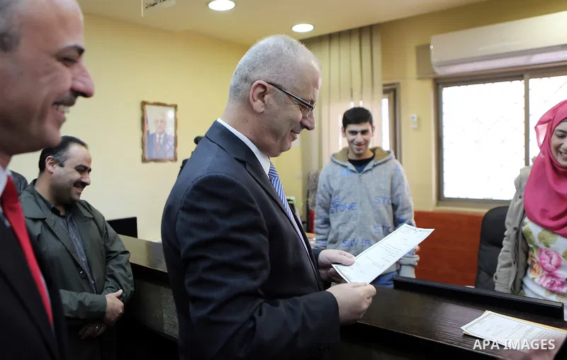 Palestinian Prime Minister Rami Hamdallah visits the headquarter of ministry of Justice in the West Bank city of Ramallah on Feb. 01, 2016. Photo by Prime Minister Office