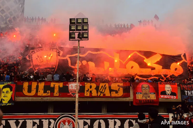 Al Ahly fans, also known as "Ultras", light flares and shout slogans at al-Ahly club's training stadium marking the fourt anniversary of killing al-Ahly fans in what known as the "Port Said massacre", on February 1, 2016...