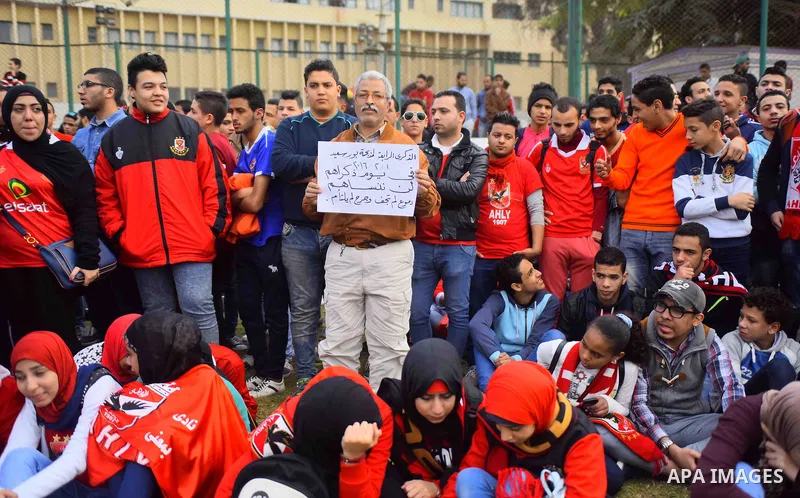 Relatives of al-Ahly fans, who were killed in what known as the "Port Said massacre", attend the fourth anniversary of killing their relatives at al-Ahly club's training stadium, on February 1, 2016. On 1 February 2012,...