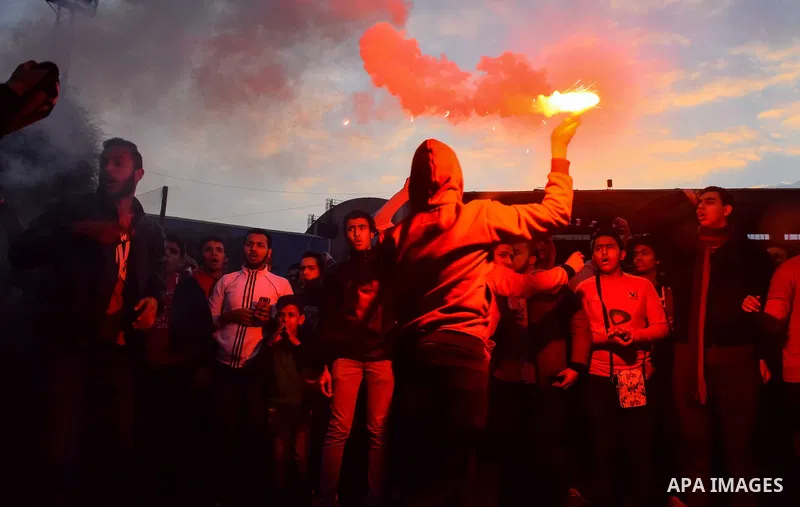 Al Ahly fans, also known as "Ultras", light flares and shout slogans at al-Ahly club's training stadium marking the fourt anniversary of killing al-Ahly fans in what known as the "Port Said massacre", on February 1, 2016...